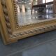 Gilded patinated trumeau mirror