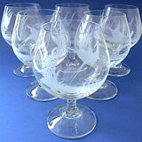 Suite of six tasting glasses of engraved crystal cognac