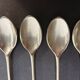 Small golden spoons with punch