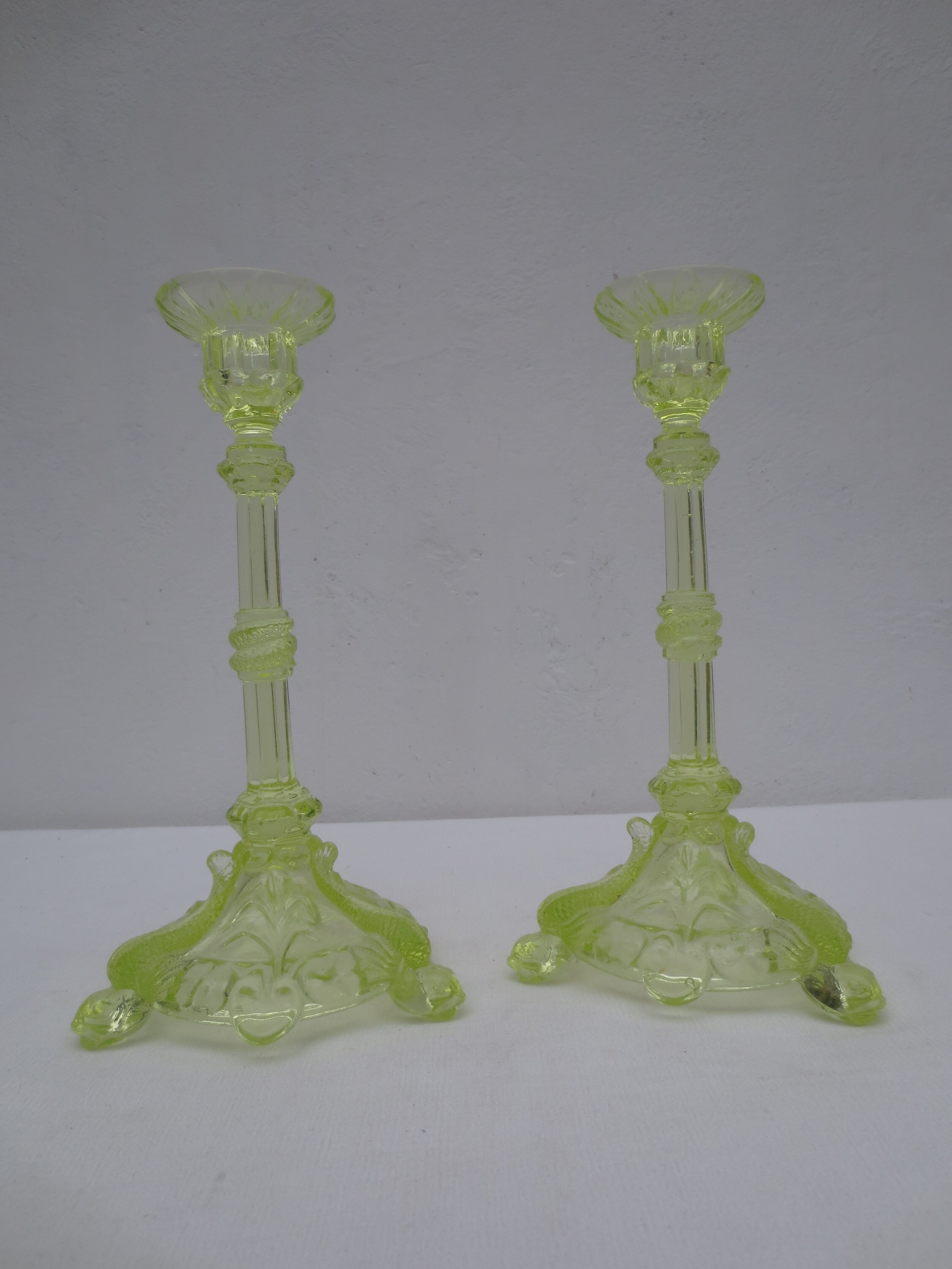 pair of old anise-green glass candlesticks