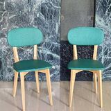 Paire de chaises vintage skaï vert pieds compas