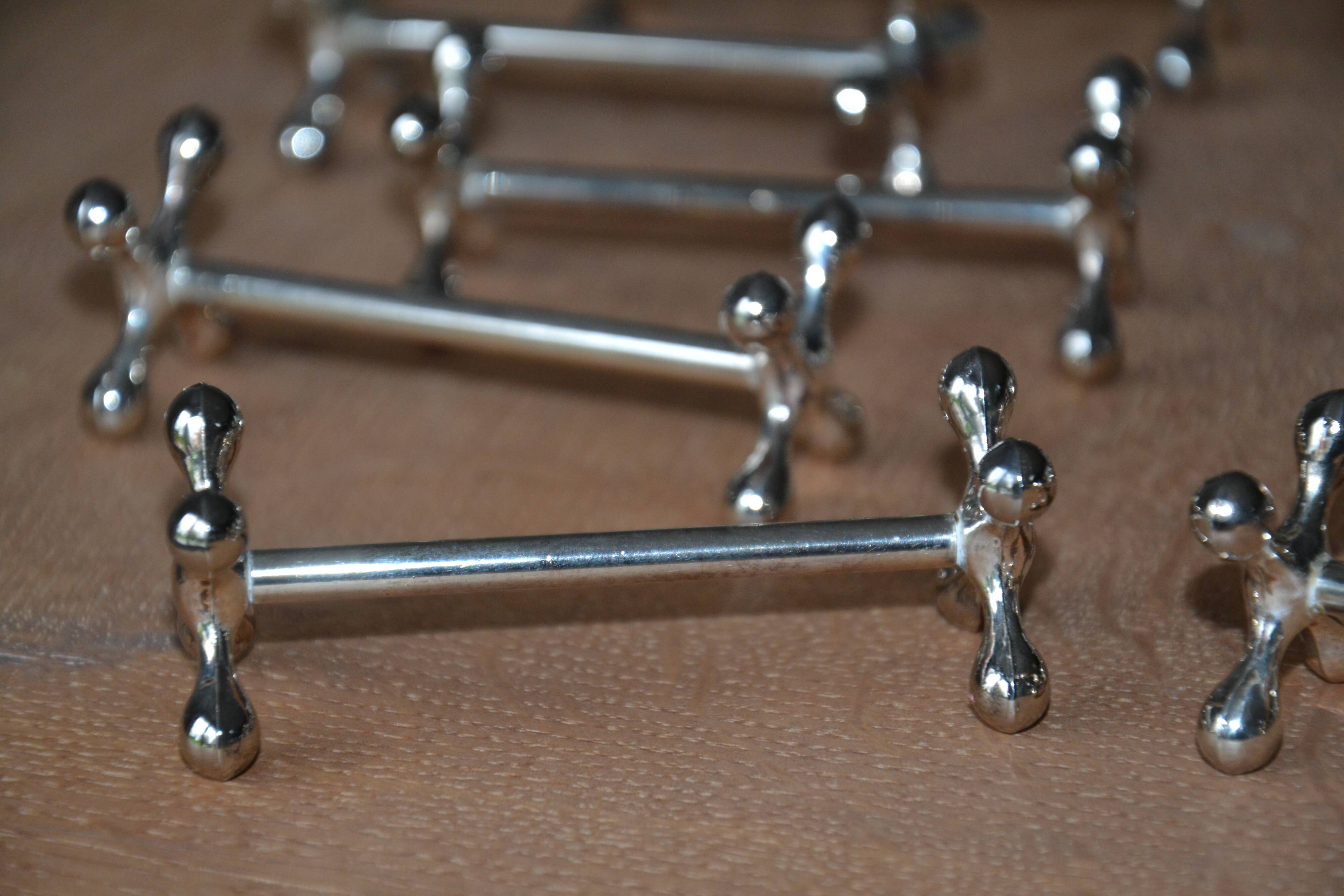 12 silver metal knife holders