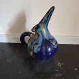 Old flamed sandstone pitcher