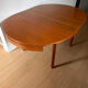 Extendable teak round table