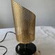 Perforated metal night light.