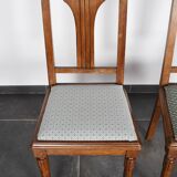 Set of 4 Art Deco chairs in carved wood.