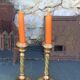 Set of two candlesticks in brass dore, pattern of ivy leaves chiseles on the columns, vintage