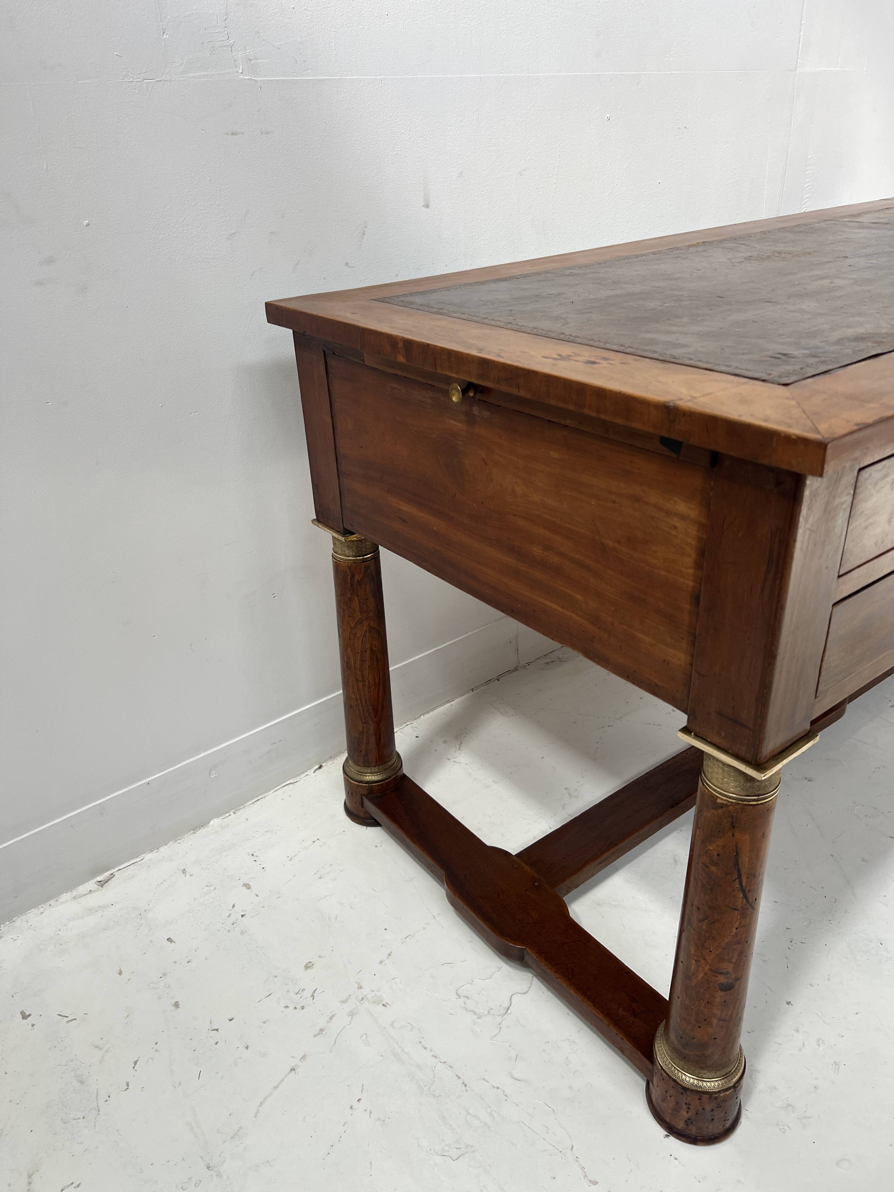 Empire style desk in mahogany and veneer, 19th century.