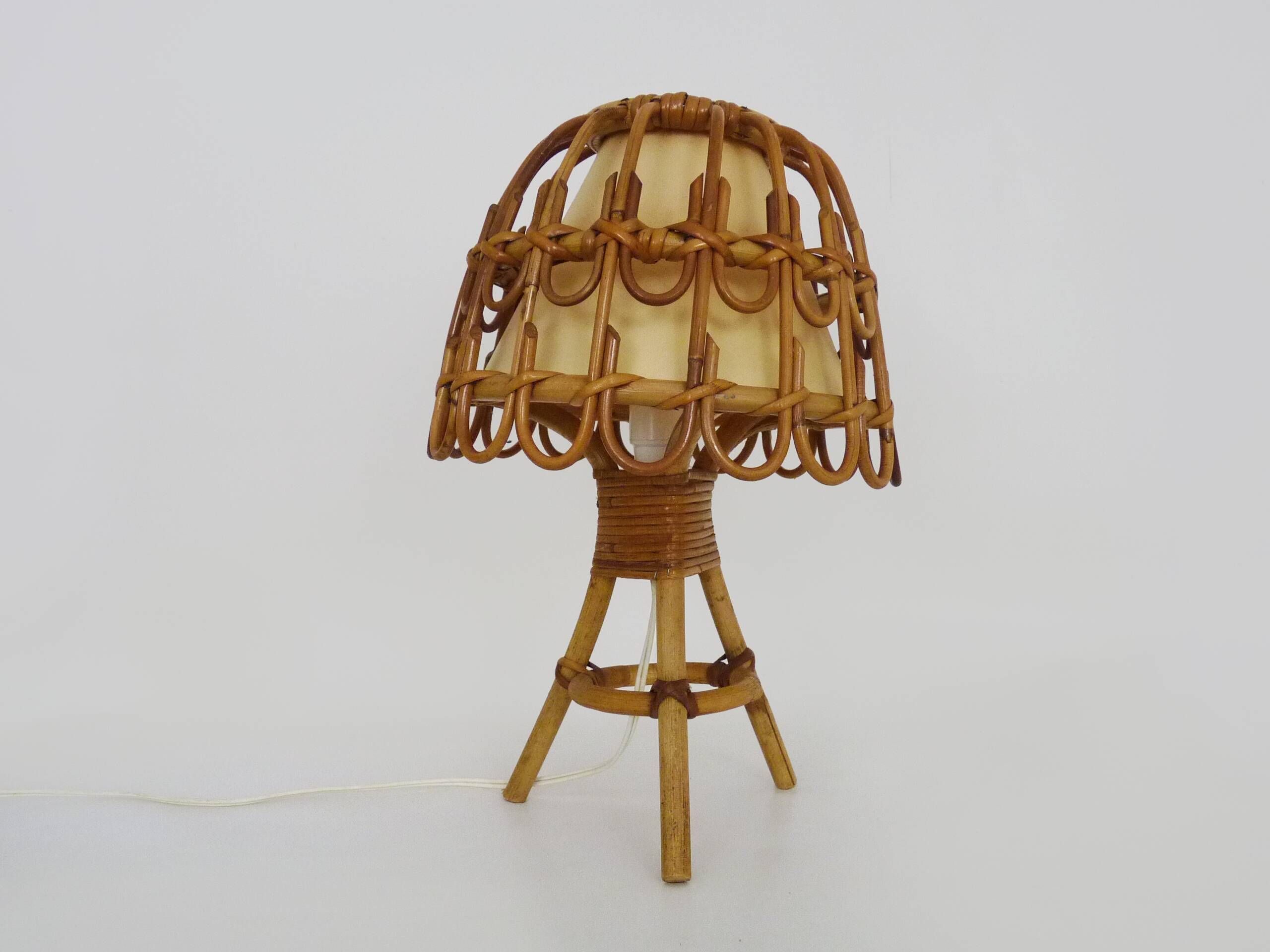 Rattan lamp in the style of Louis Sognot from the 1950s.