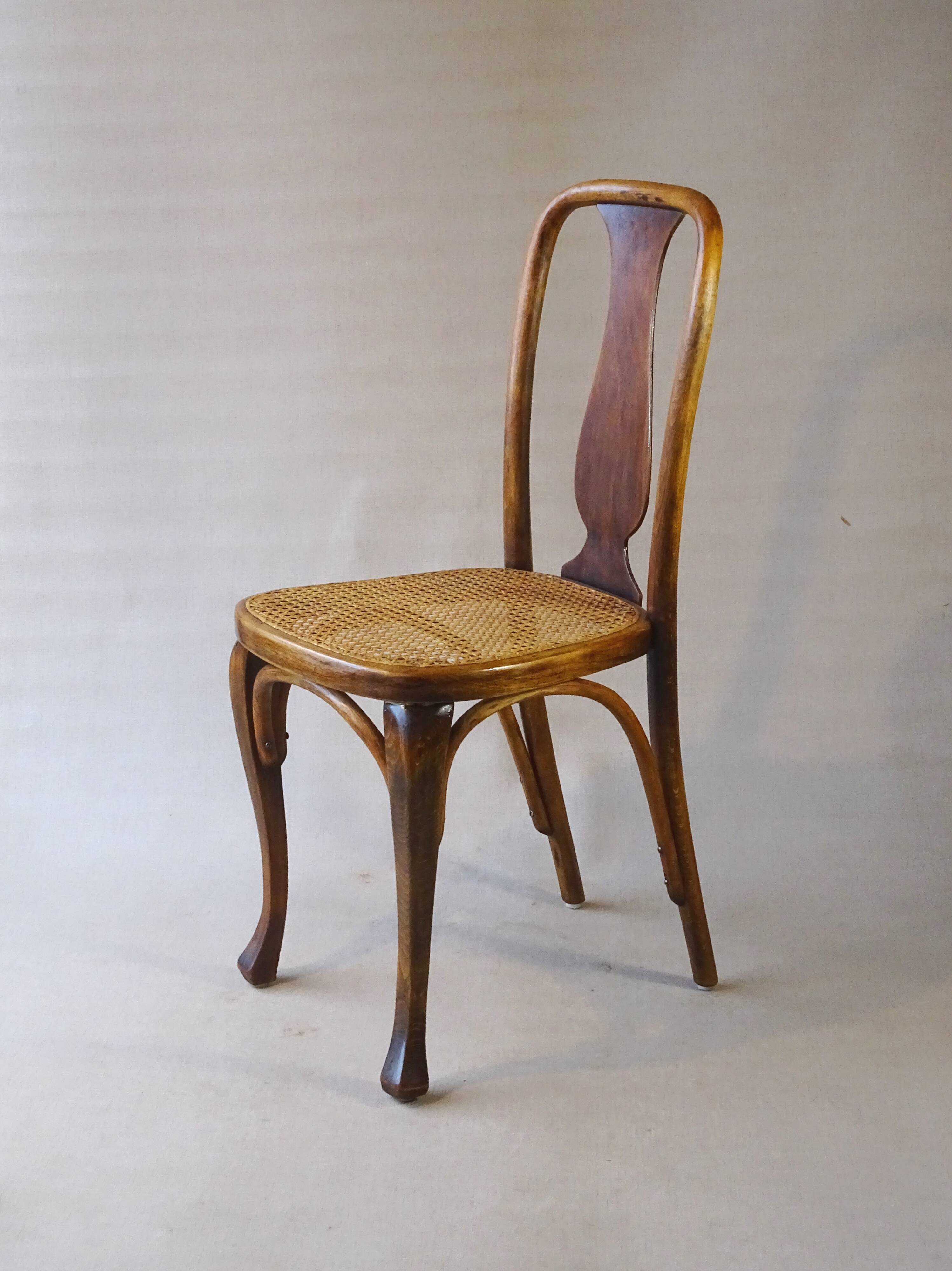 Two Kohn chairs, No. 529, circa 1910, bistro style, caned, bentwood