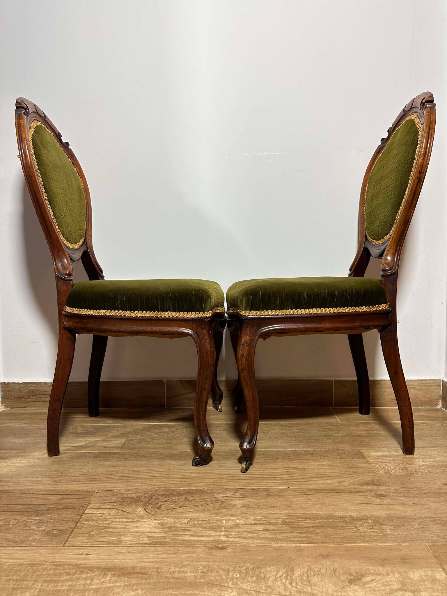 A pair of antique upholstered side chairs/Victorian balloon-back