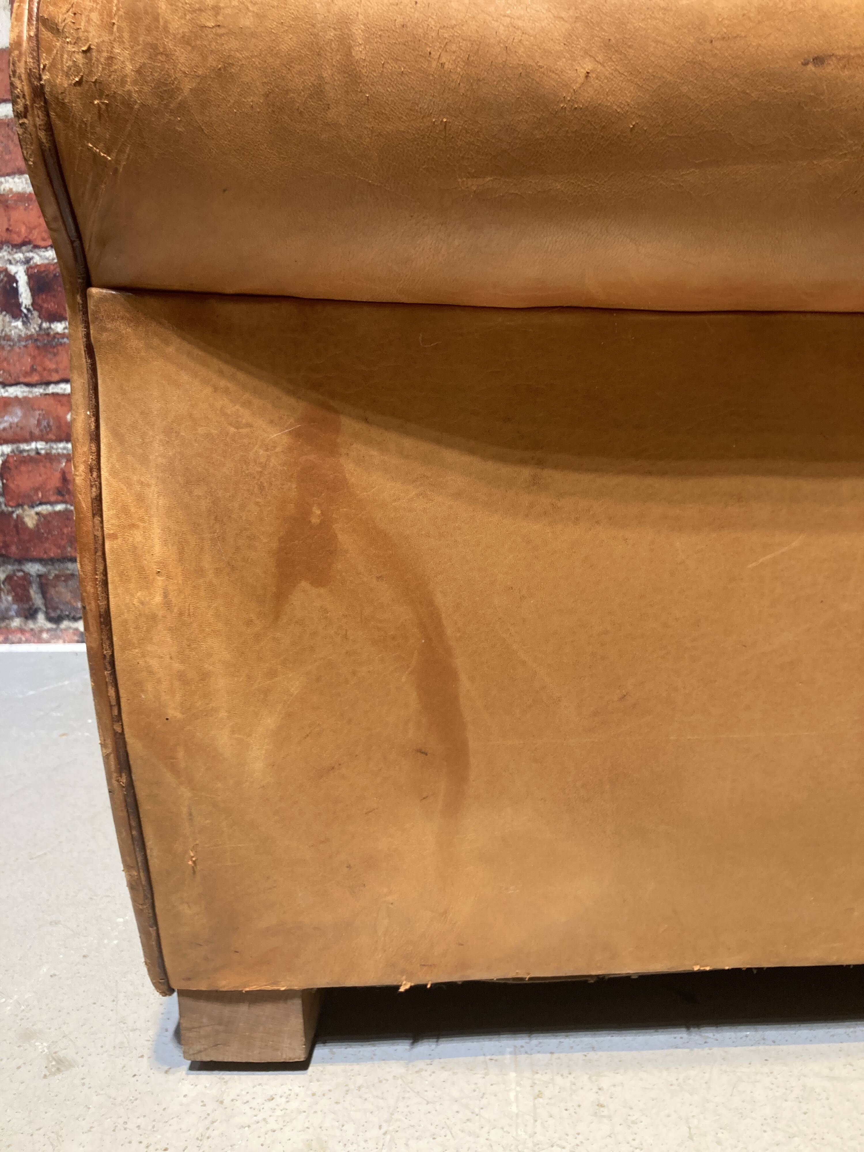Brown leather armchair