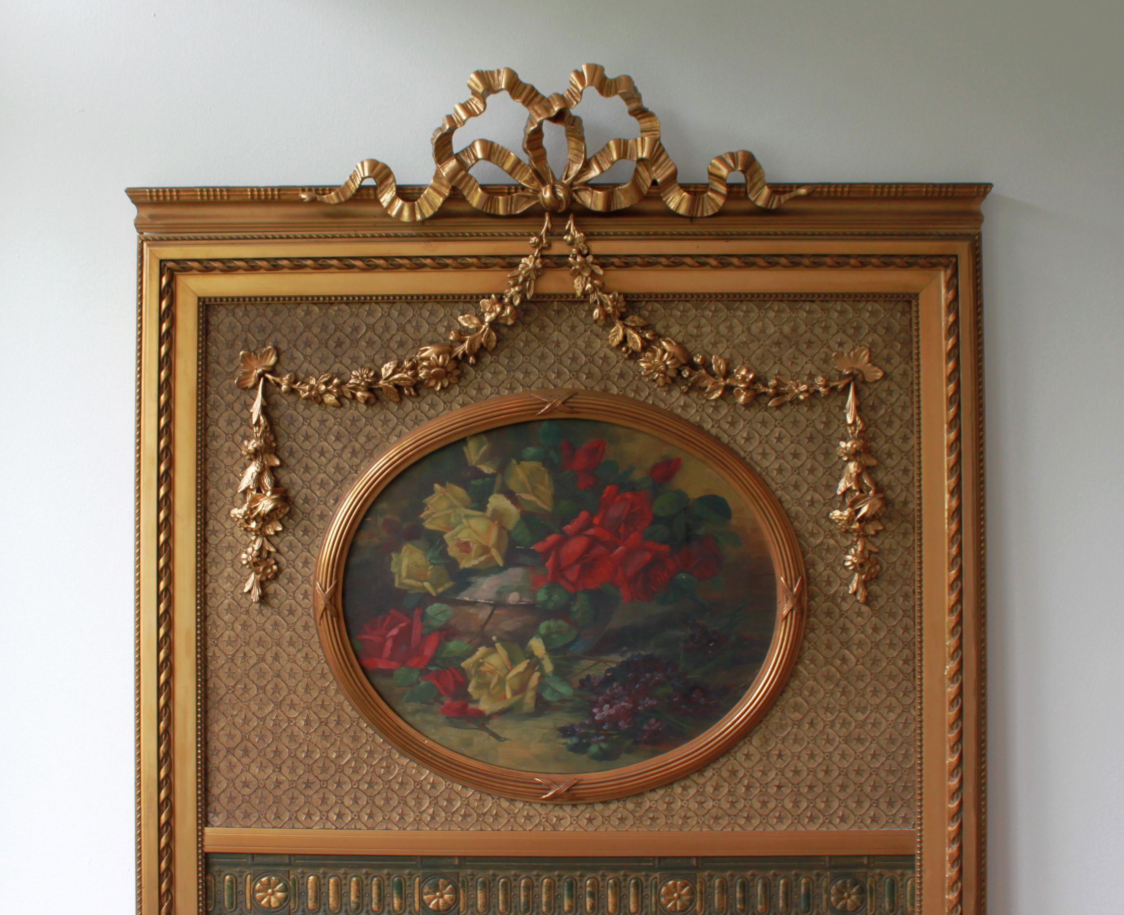 Trumeau mirror with oval decoration and Louis XVI style pediment