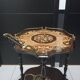 Marquetry trolley on wheels