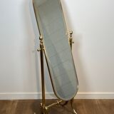 Pair of brass cheval mirrors in neoclassical style