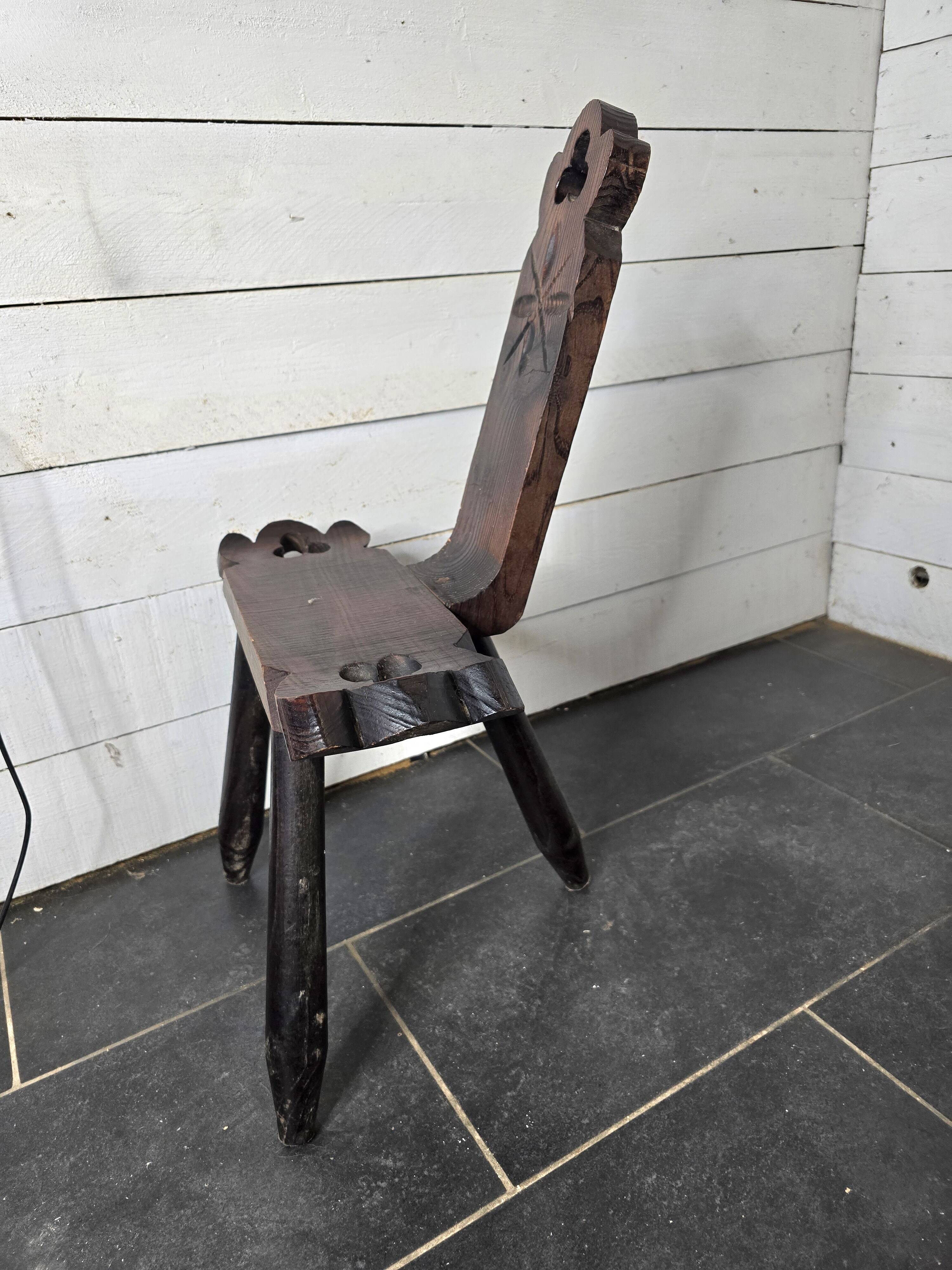 Vintage Spanish tripod chair in carved wood