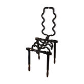 Contemporary "skeleton" chair in black lacquered steel