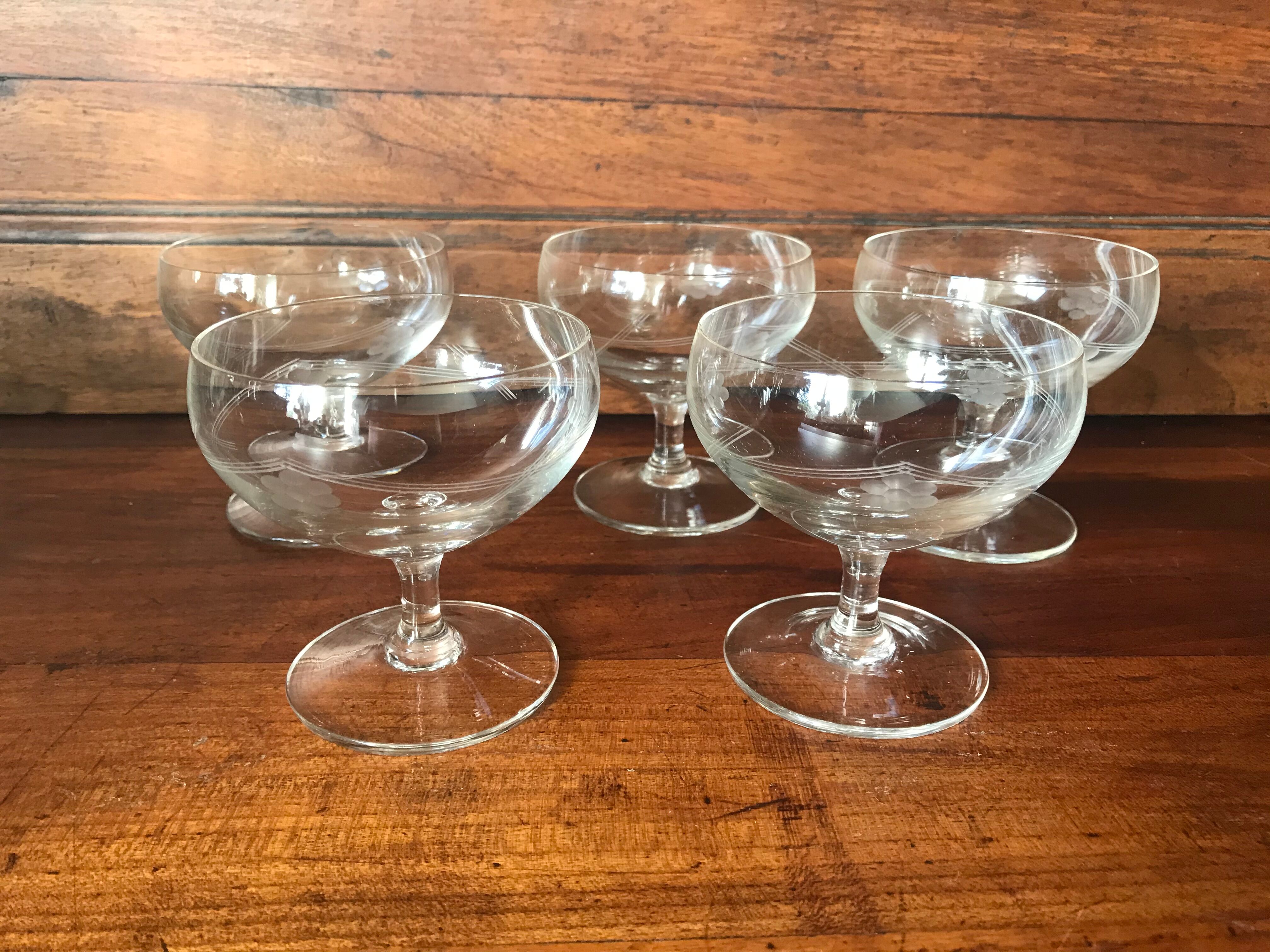 Set of five crystal champagne glasses
