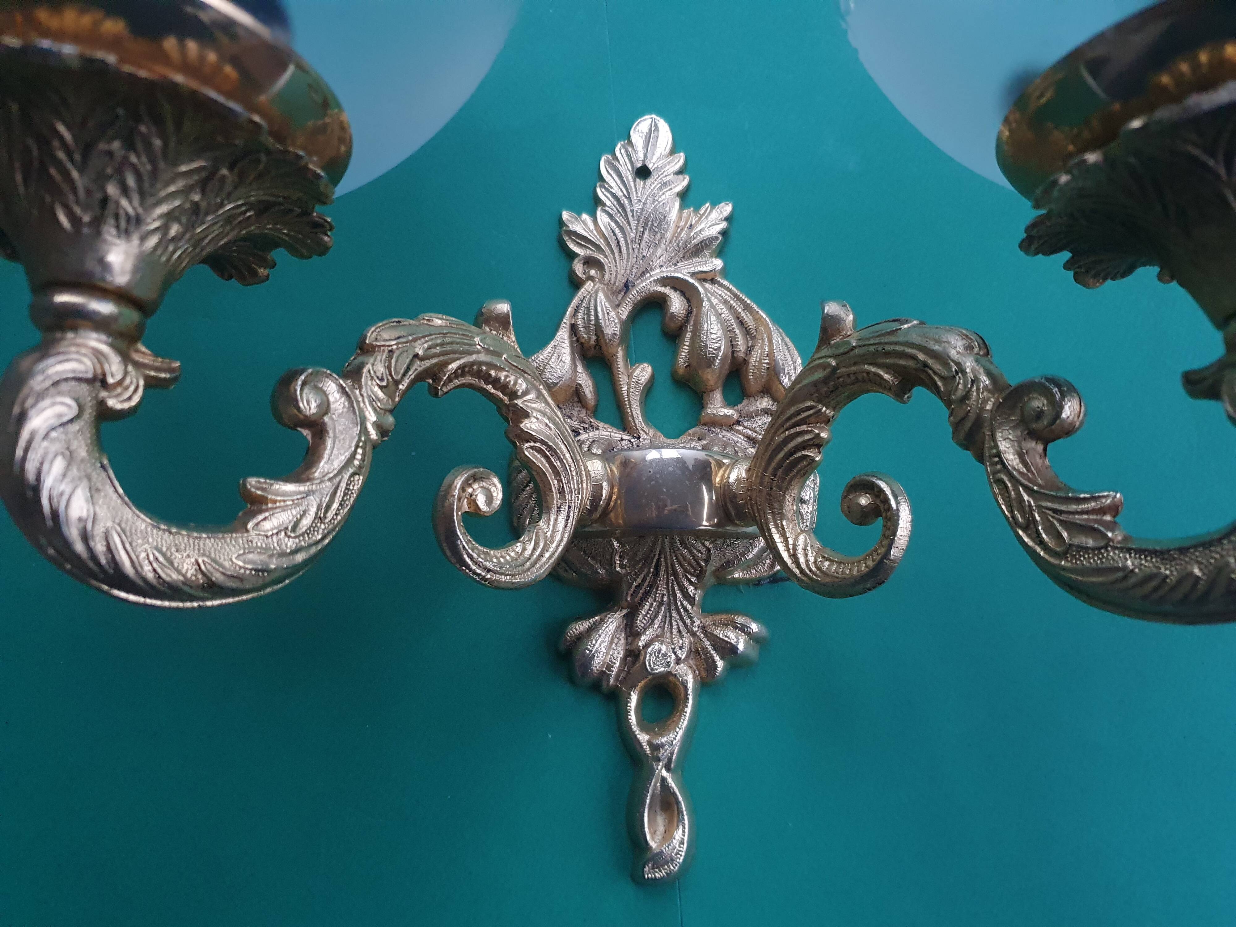 Pair of large double-light wall sconces in vintage brass and glass