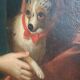 Portrait of a woman with a small dog.