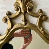 Large golden baroque style mirror