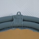 Sage green painted rattan mirror
