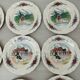 12 plates of the Obernai earthenware décor service signed Henri Loux