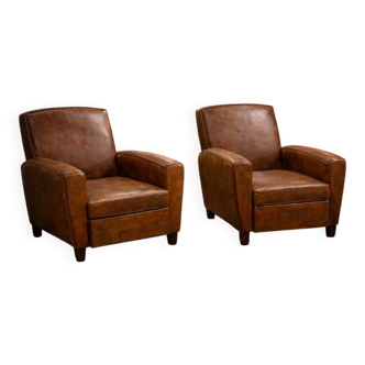 Paire de fauteuils club en cuir – Milieu du XXe siècle