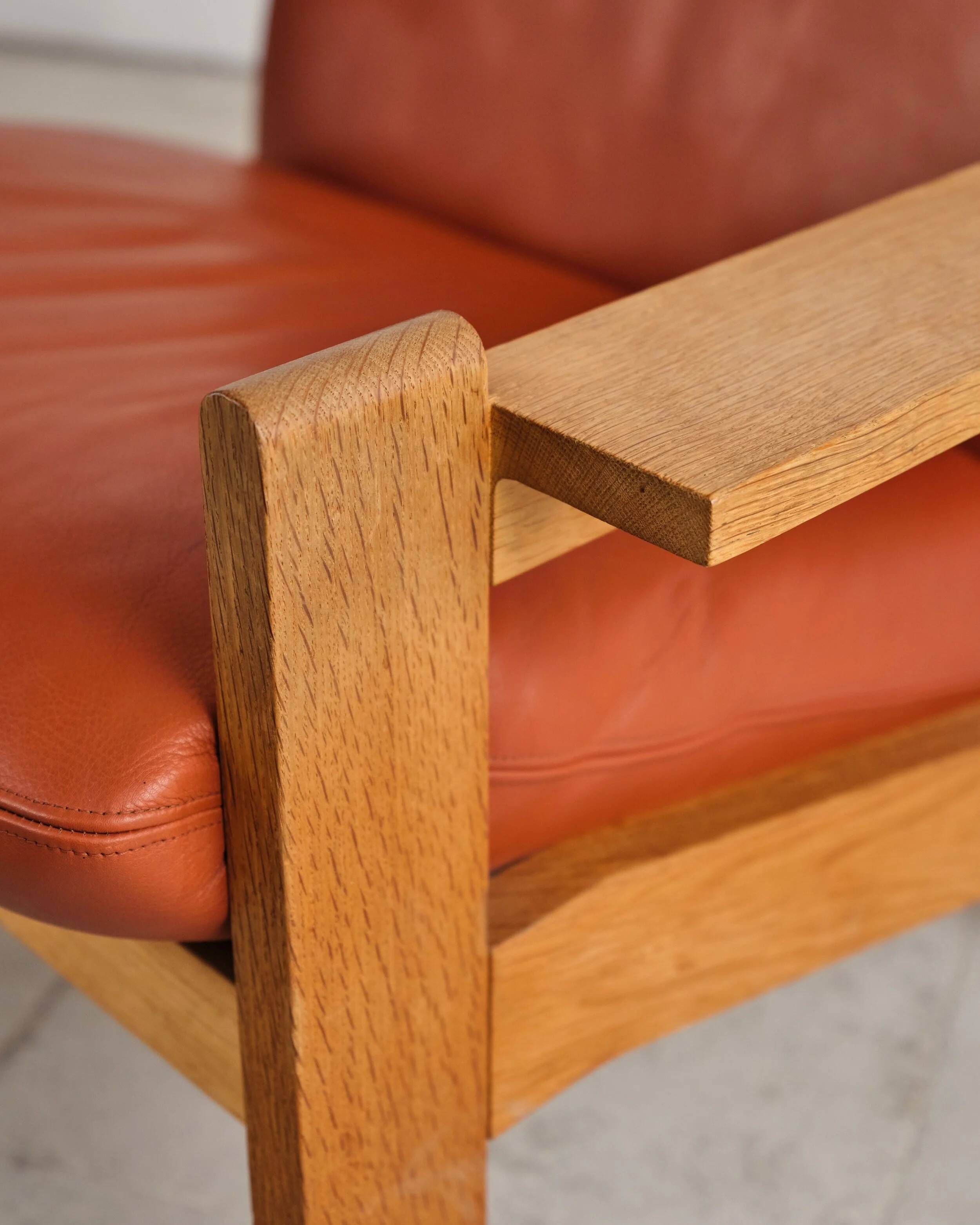 Brutalist oak and leather sofa, Tage Poulsen, 4 pieces, Denmark, 1970s.