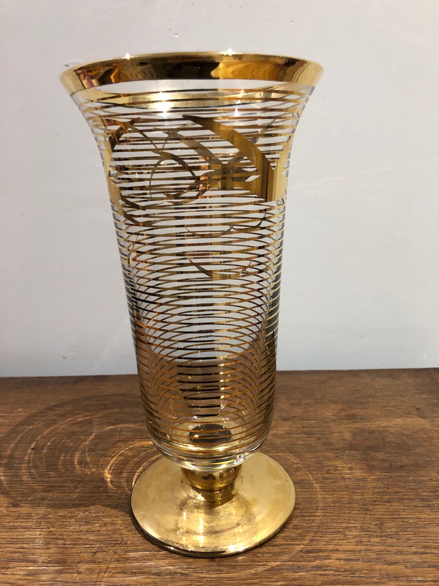 Glass vase with gold bird decoration