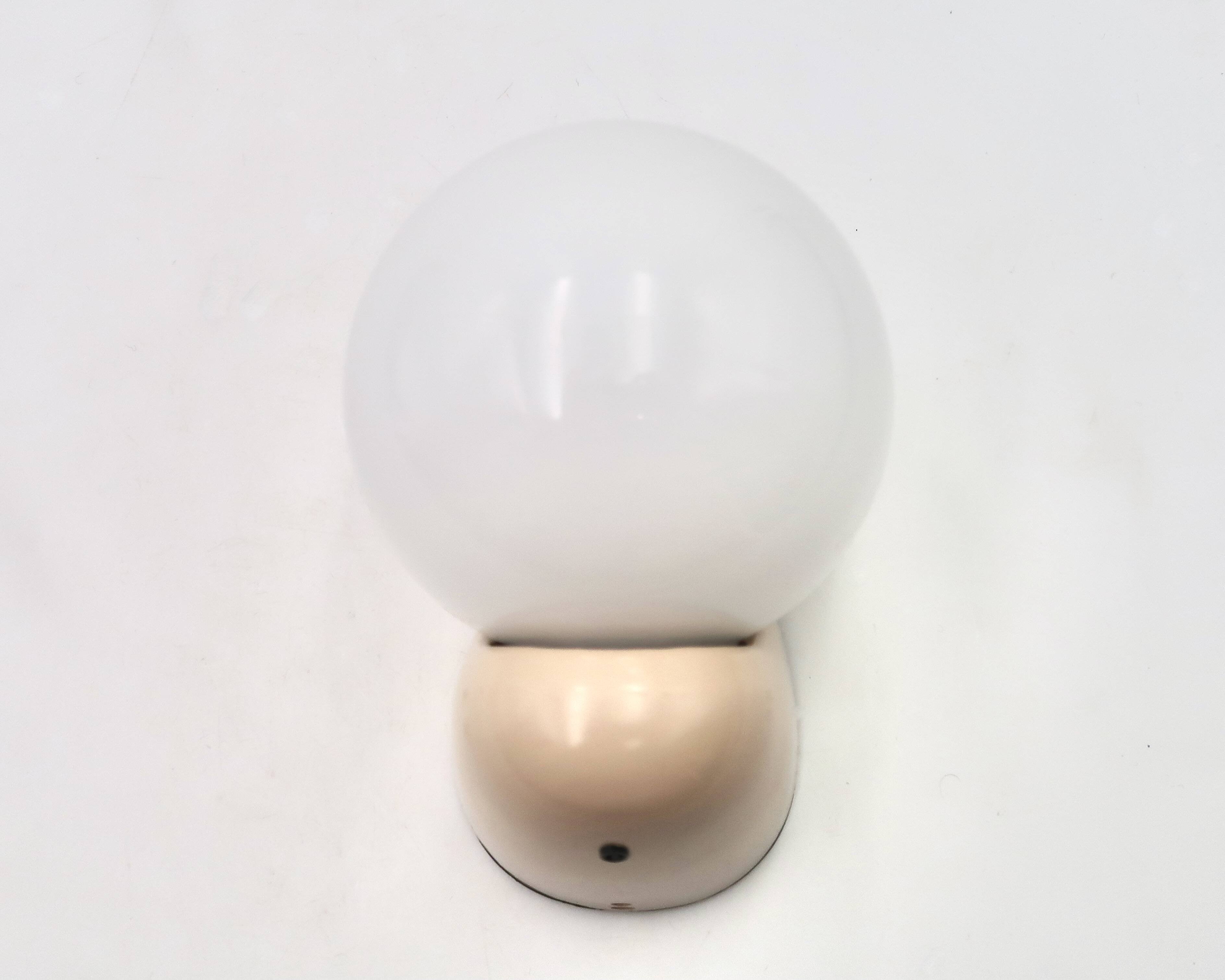 Beige Tissot wall light with opaque white glass globe, 1970s 80s.
