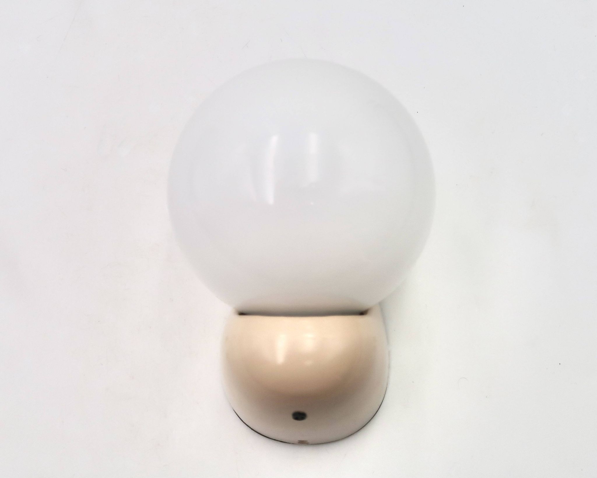 Beige Tissot wall light with opaque white glass globe, 1970s 80s.