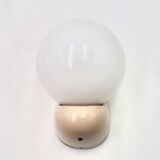 Beige Tissot wall light with opaque white glass globe, 1970s 80s.