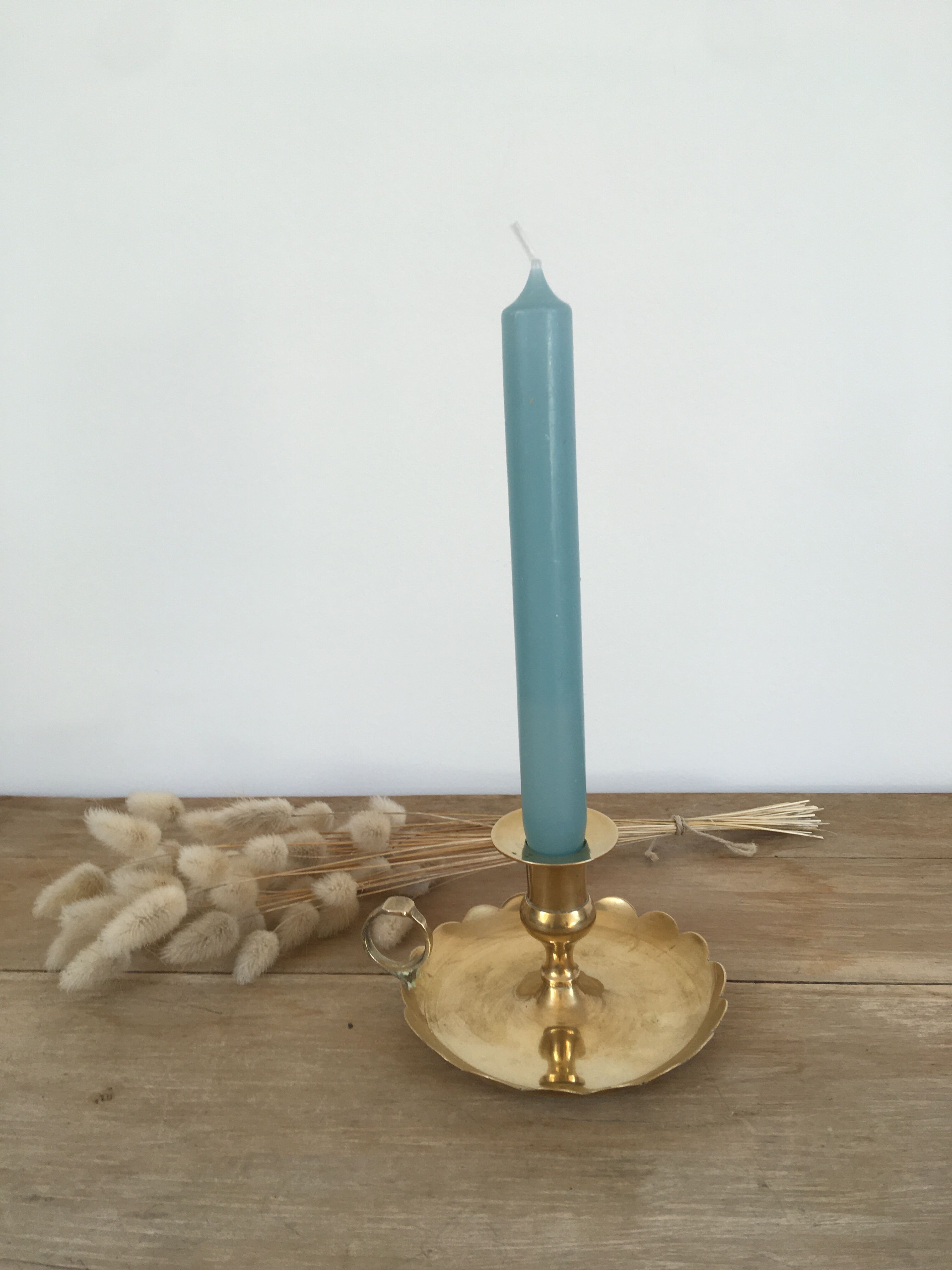 Brass cellar rat candle holder