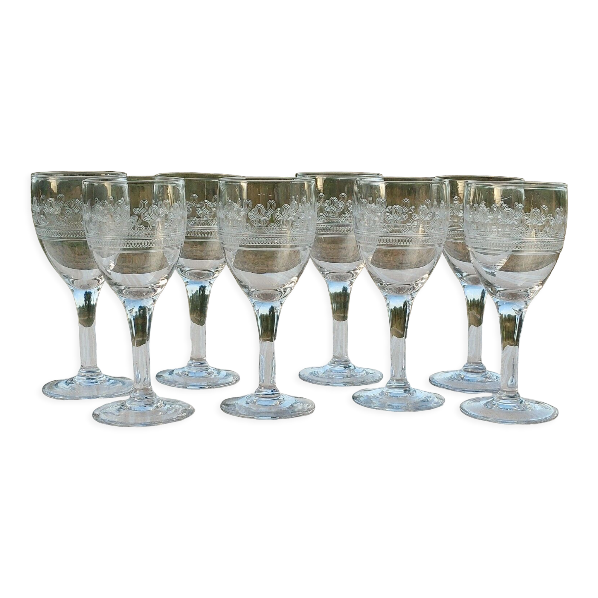8 old white wine glasses engraved with a frieze late 19th early 20th