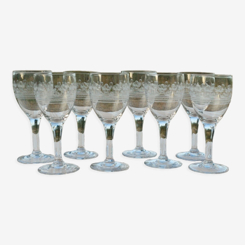 8 old white wine glasses engraved with a frieze late 19th early 20th