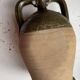 Varnished terracotta oil jar