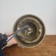 Antique bronze wall light in Louis XVI style - tulip-shaped glass paste flower.