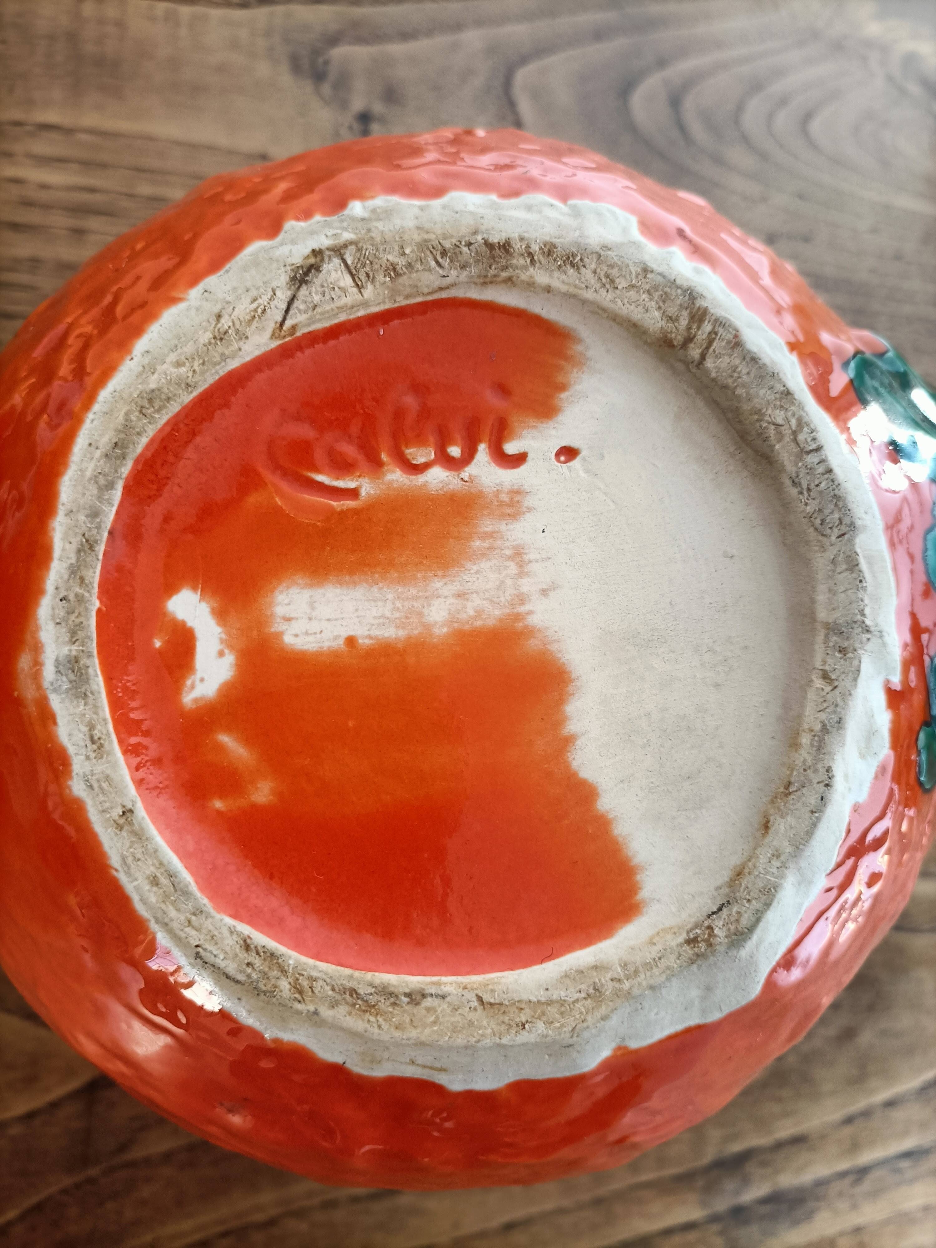 Orange pitcher in Corsican slip