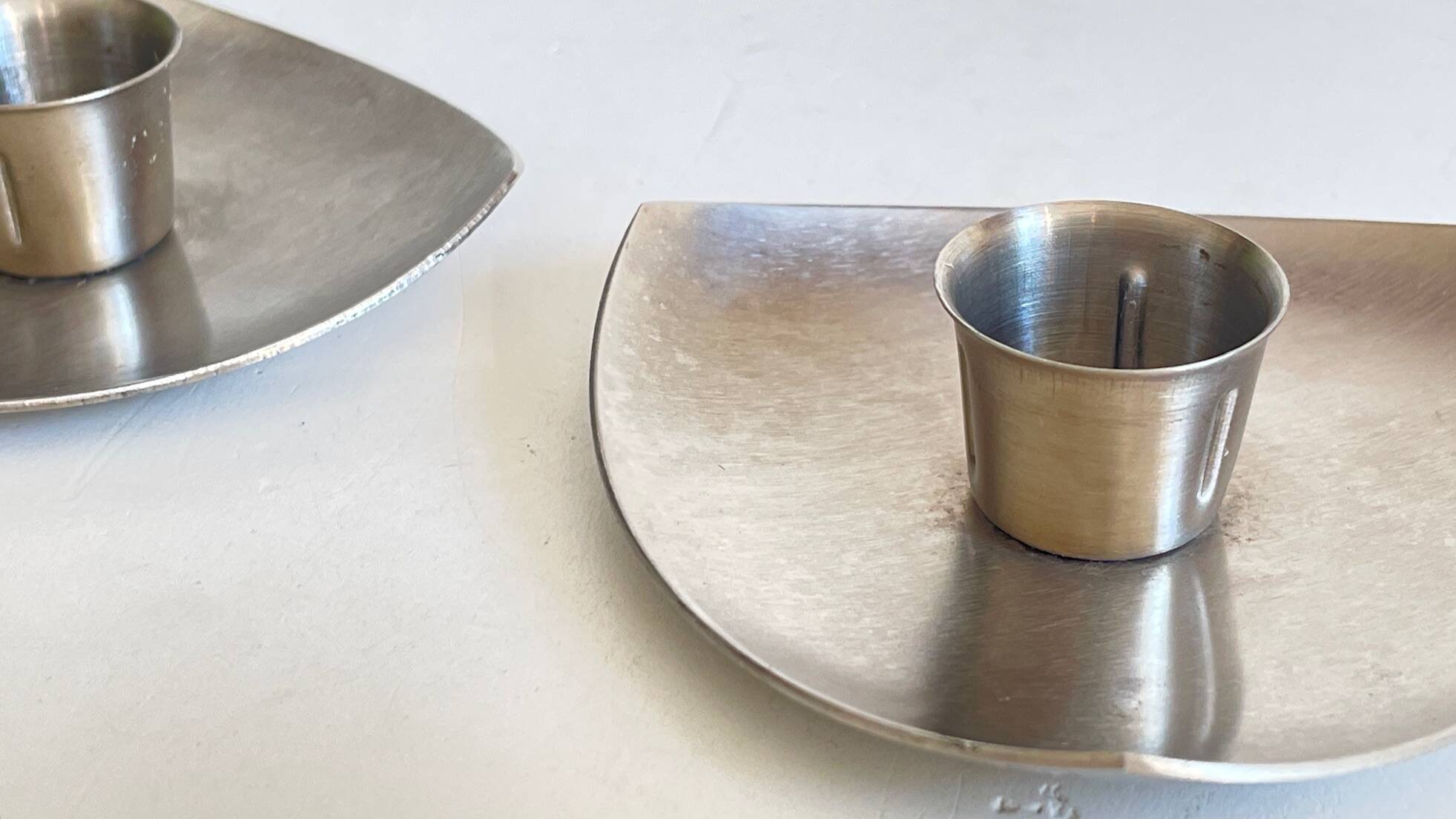 Vintage brushed metal geometric candle holders