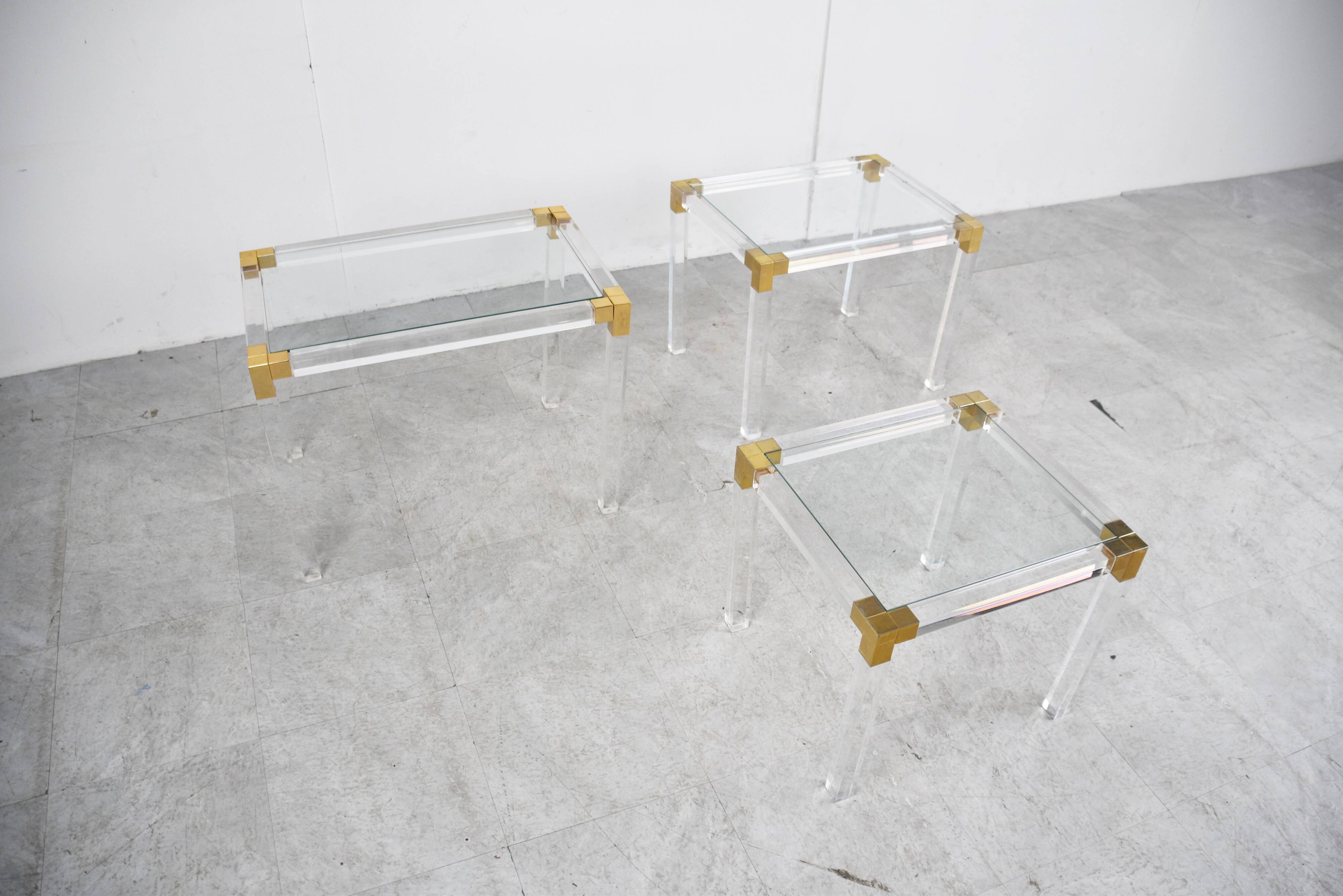 Vintage lucite and brass nesting tables, 1970s