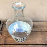 Vintage decanter with black and white tiles