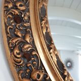 Carved golden witch mirror