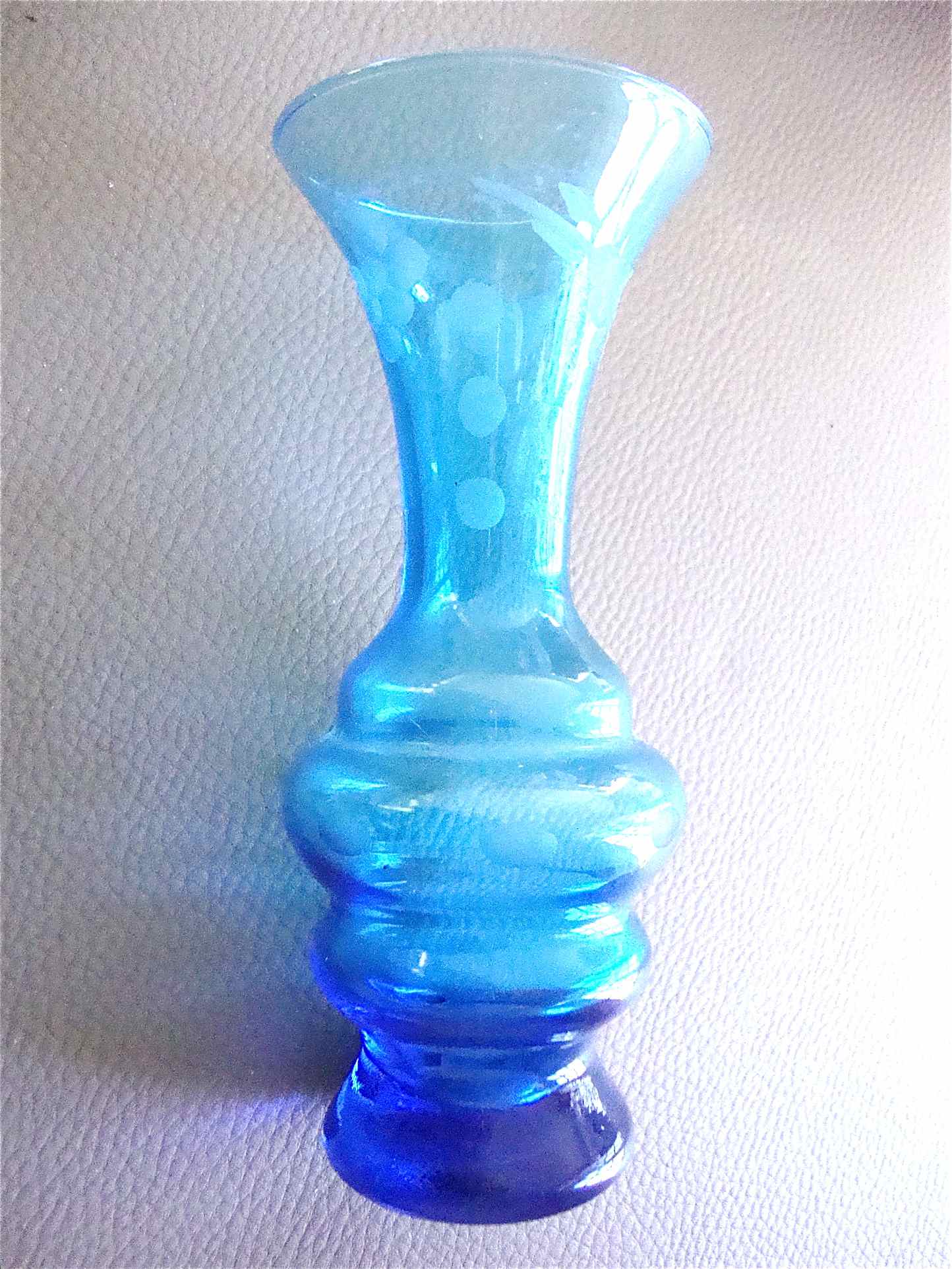 Ancient vase in engraved glass