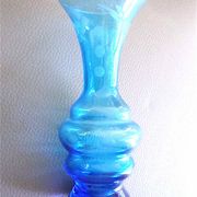Ancient vase in engraved glass