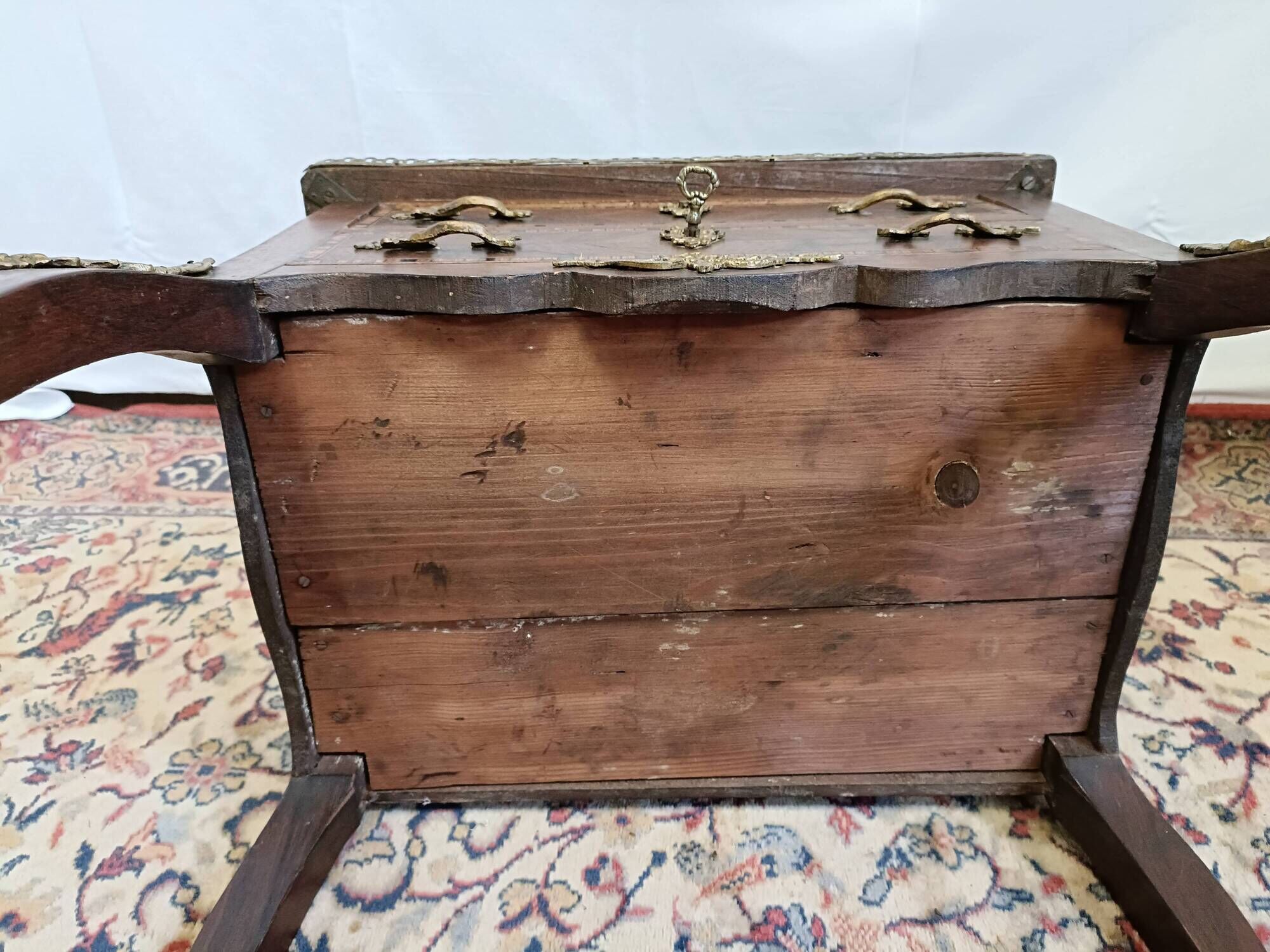 Small Louis XV chest of drawers in inlaid wood