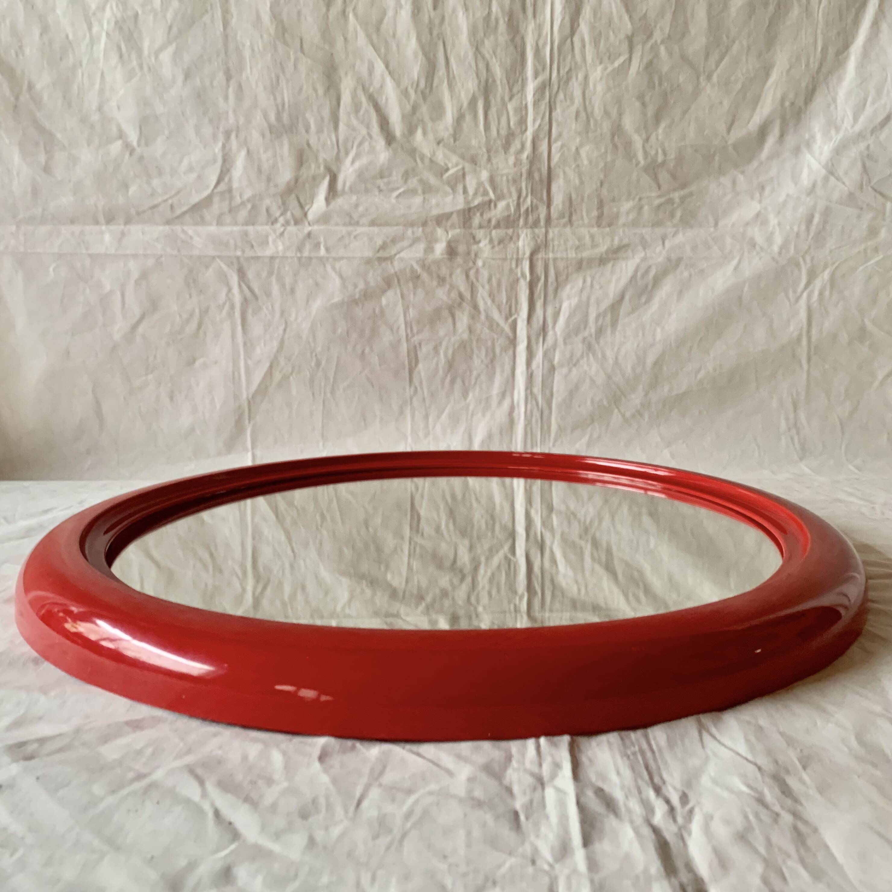 Vintage round red plastic mirror