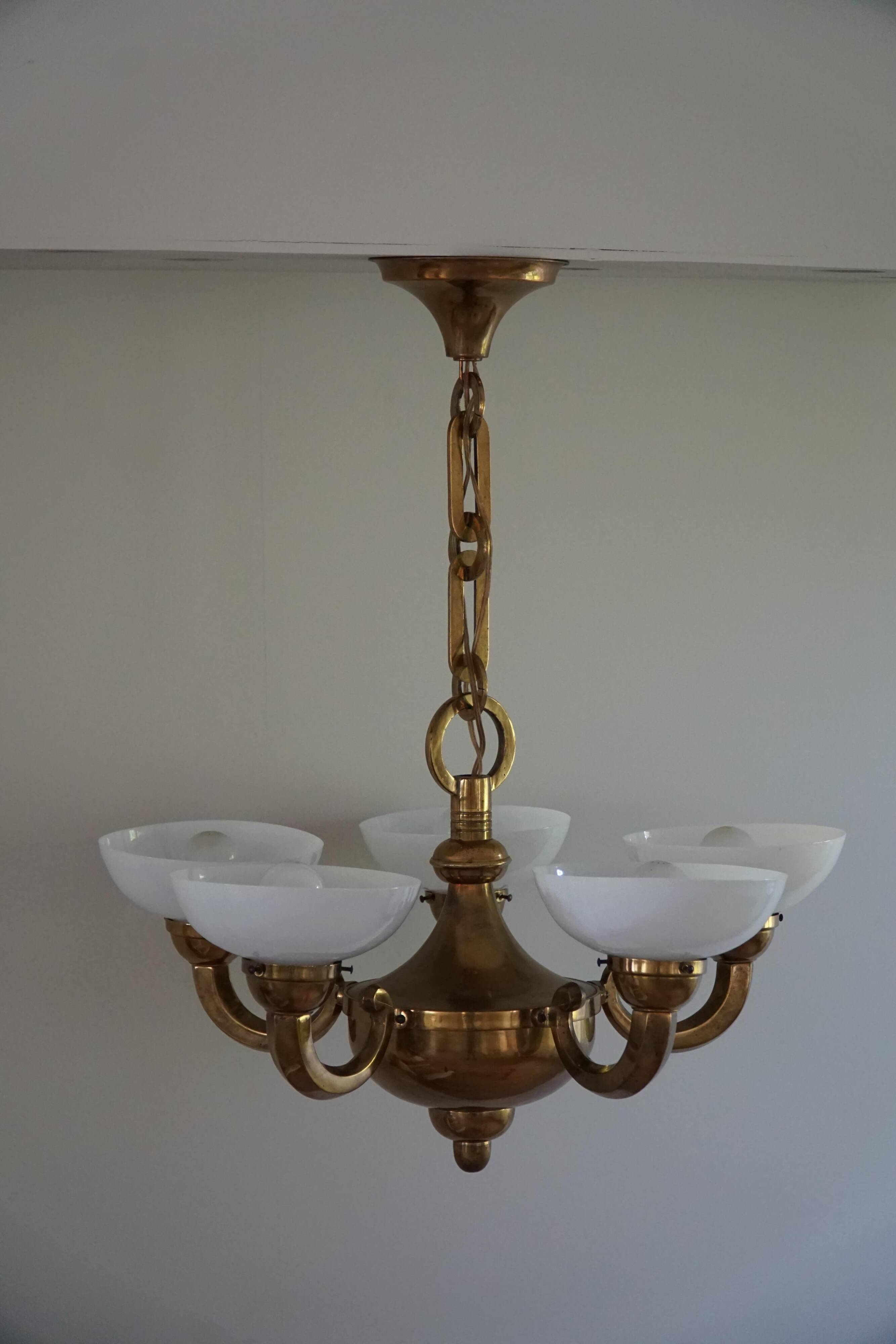 A modern Danish Art Deco chandelier, glass and brass, 1940s.