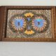 Wooden vintage plateau with butterfly decoration