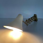 Cream metal and brass wall lamp with scissors design by Karl Lang for SIS Licht, 1950s, Germany.